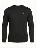 Black Dockside performance long sleeve shirt made of smooth, stretch fabric with embroidered white logo on chest.