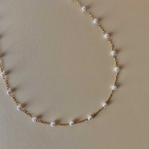 Minimalistic Ariel Chain Necklace with scattered pearls in 18K gold plated stainless steel, hypoallergenic and water resistant.
