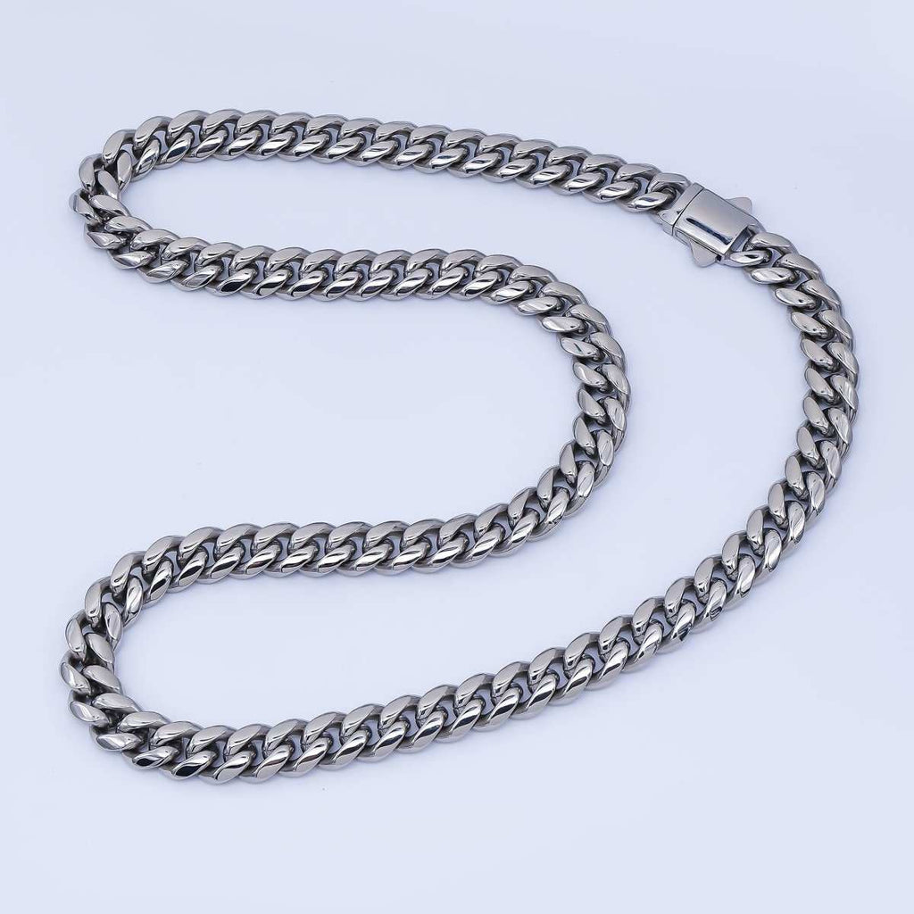 Cuban link chain necklace in Chunky Stainless Steel, with a polished silver-tone finish and thick interlocking links.