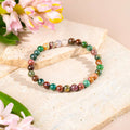 Close-up of a 6mm Energy Bracelet made of natural Indian Agate stones for emotional strength and energy boost